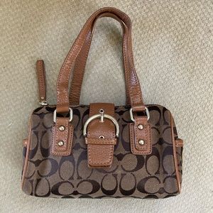 Brown Coach clutch with magnetic snap